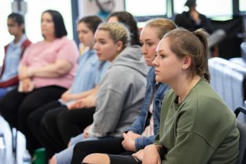 Young people listening in a group 